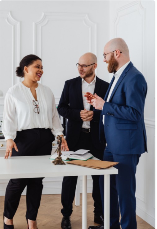 Business professionals discussing a client engagement